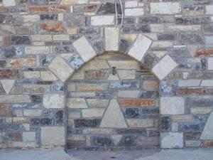 Detail showing the outside water tap.