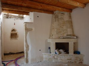 Stone corner fireplace.
